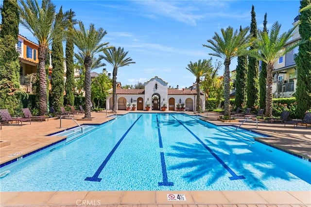 view of pool featuring a patio area