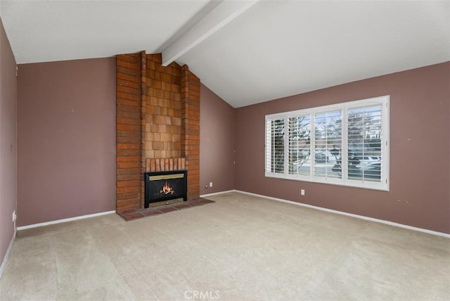 unfurnished living room with lofted ceiling with beams, light carpet, and a fireplace