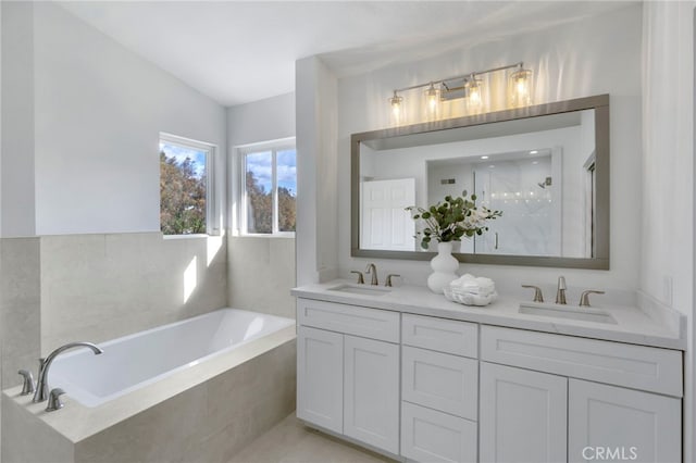 bathroom with vanity, separate shower and tub, and lofted ceiling