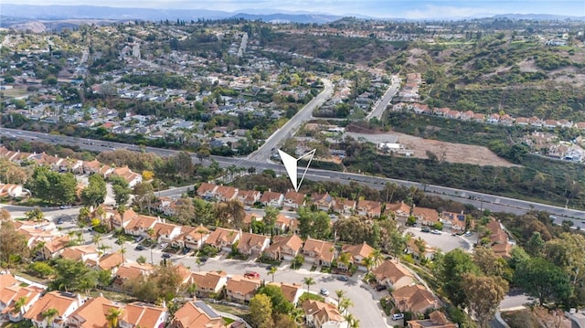 birds eye view of property featuring a mountain view