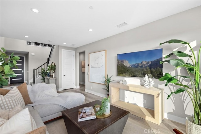 living room with wood-type flooring