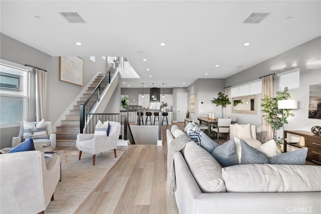 living room featuring light wood-type flooring