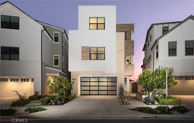 view of front of property featuring a garage