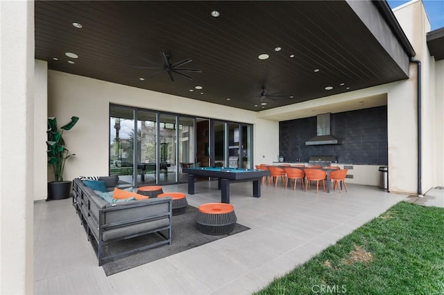 view of patio / terrace featuring an outdoor living space, grilling area, and ceiling fan