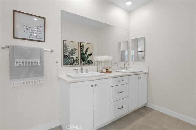 bathroom featuring vanity and tile patterned flooring