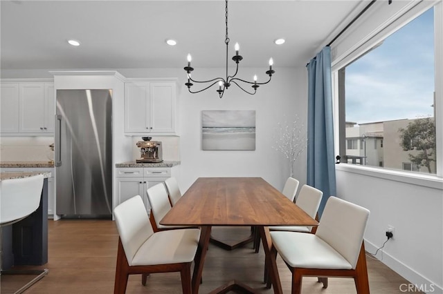 dining space featuring dark hardwood / wood-style flooring