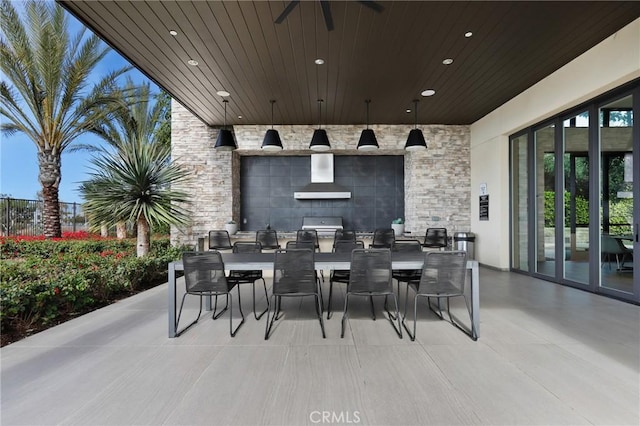 view of patio with exterior kitchen and grilling area