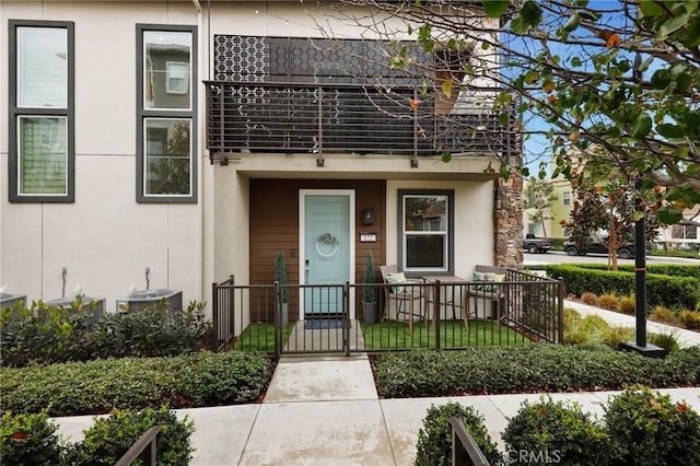 view of front of house with central AC unit