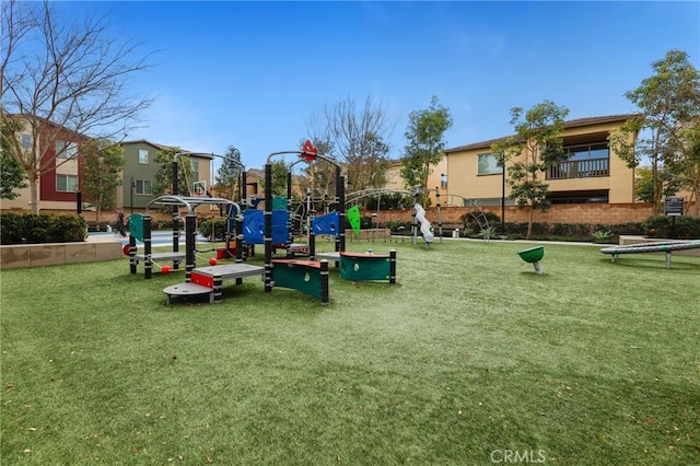 view of playground featuring a lawn