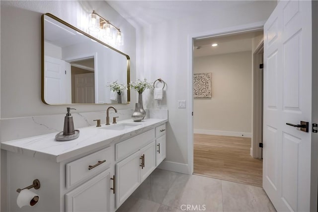 bathroom featuring tile patterned floors and vanity