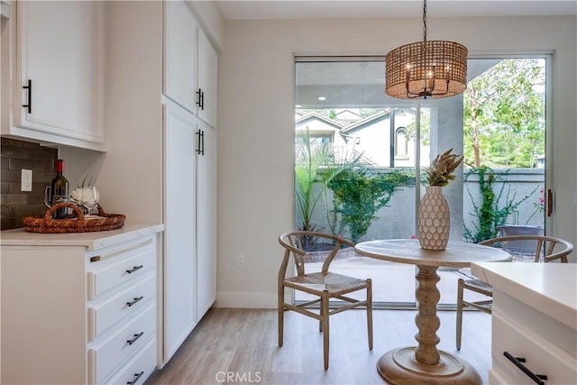 dining room featuring light hardwood / wood-style flooring