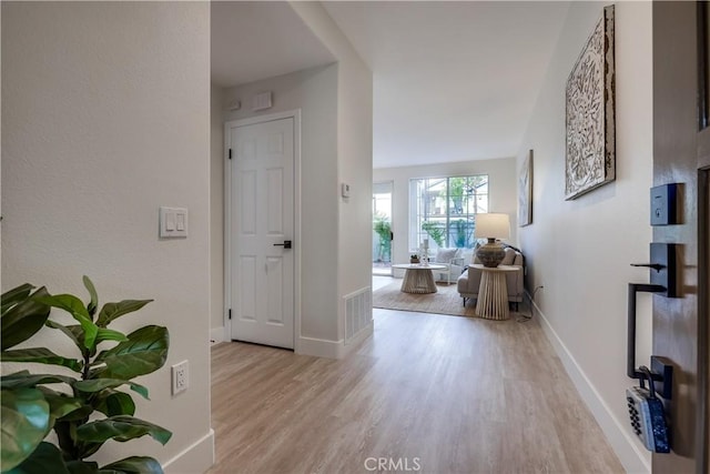 hall featuring light hardwood / wood-style flooring