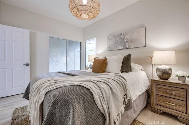 bedroom with light hardwood / wood-style flooring