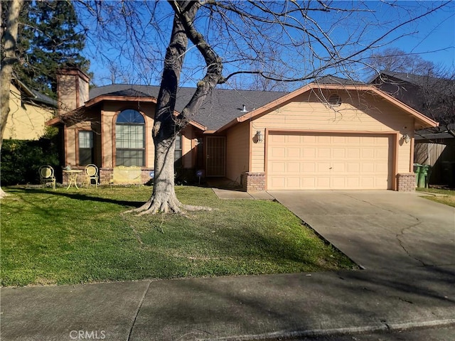 single story home featuring a garage and a front yard