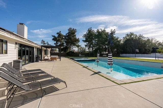 view of pool featuring a patio area