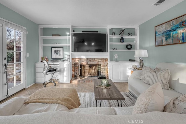 living room featuring a fireplace