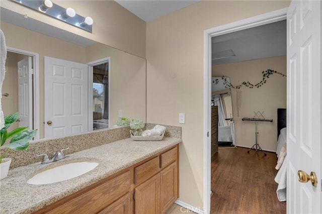 bathroom featuring vanity and hardwood / wood-style floors