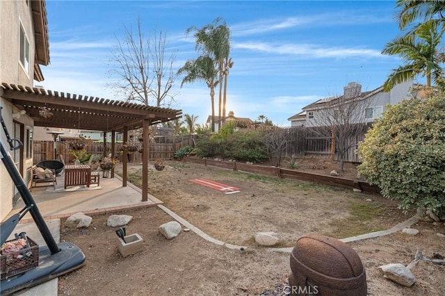 view of yard with a pergola and a patio