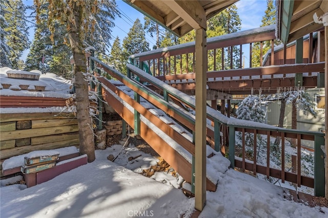 view of snow covered deck