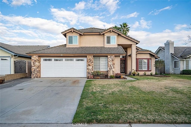 view of property featuring a garage and a front lawn