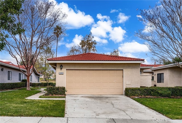 view of front of house featuring a garage and a front yard