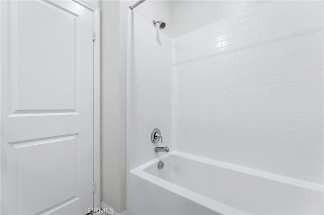 bathroom with shower / bathtub combination