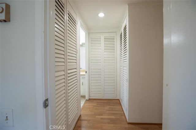 465 Avenida Sevilla Unit C, Laguna Woods, CA 92637 - hall featuring light wood-type flooring, baseboards, and recessed lighting