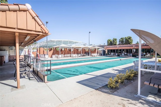 465 Avenida Sevilla Unit C, Laguna Woods, CA 92637 - view of pool featuring shuffleboard