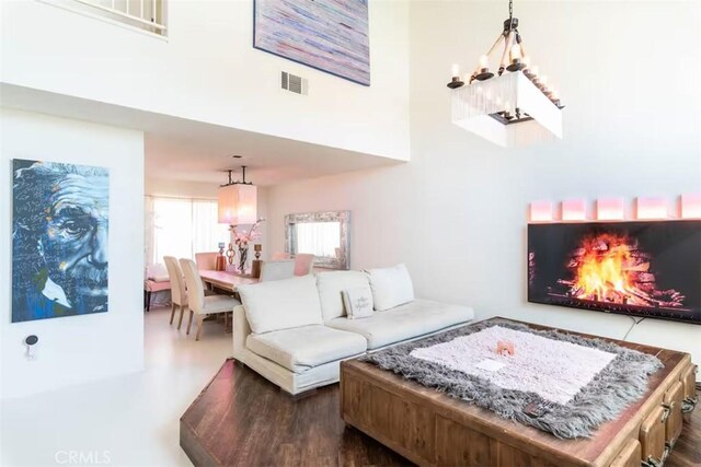 living room featuring a chandelier