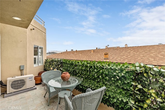 view of patio / terrace with ac unit