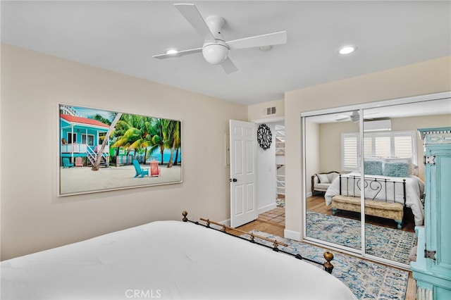 bedroom featuring ceiling fan and a closet