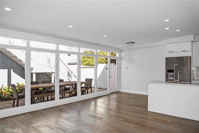 interior space featuring dark wood-type flooring and sink