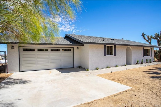 single story home with a garage