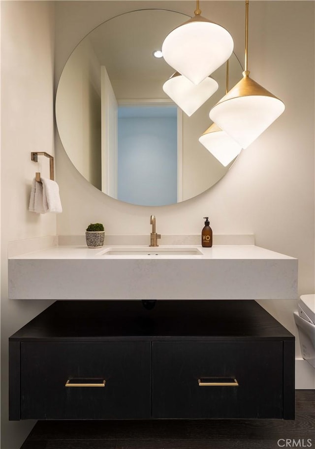 bathroom with vanity and toilet