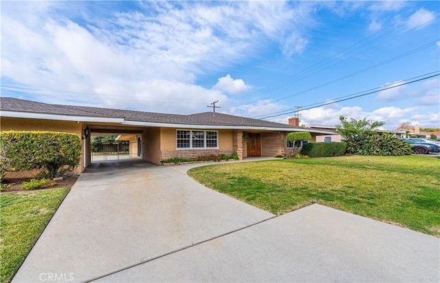 ranch-style home with a front lawn and a carport