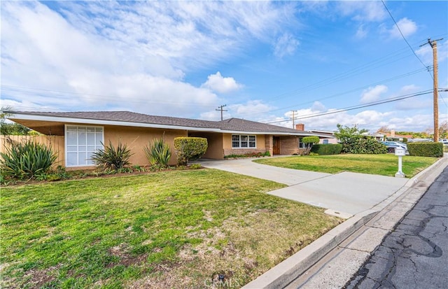 single story home with a front yard