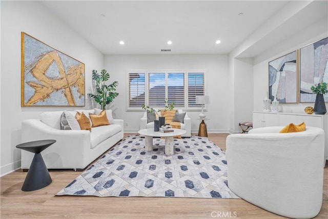 living room featuring light wood-type flooring