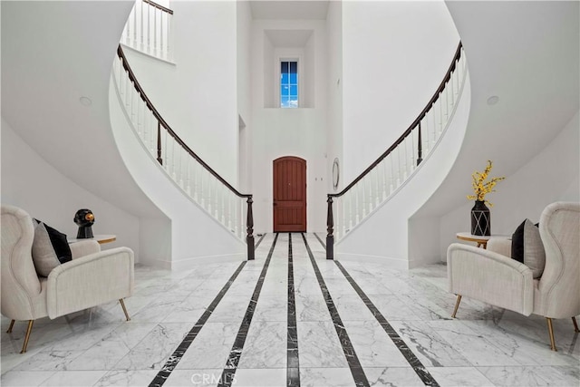 entrance foyer featuring a high ceiling