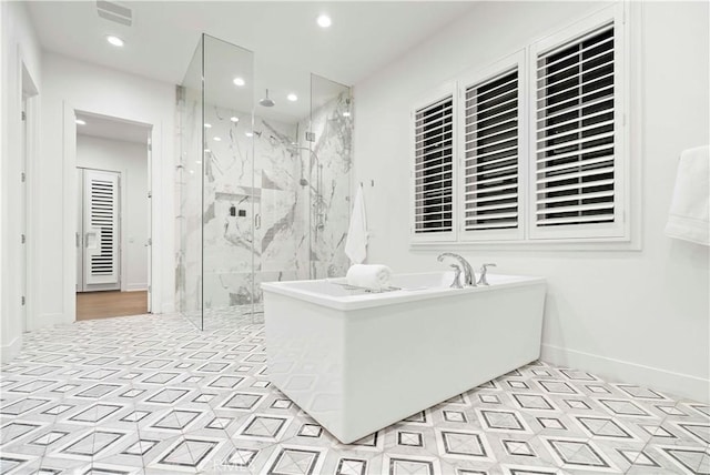 bathroom featuring an enclosed shower