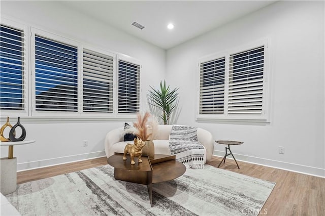 living area featuring light hardwood / wood-style floors