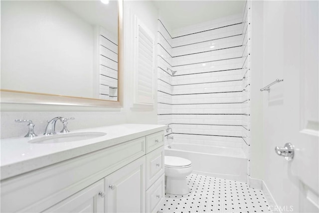 full bathroom with shower / tub combination, vanity, and toilet