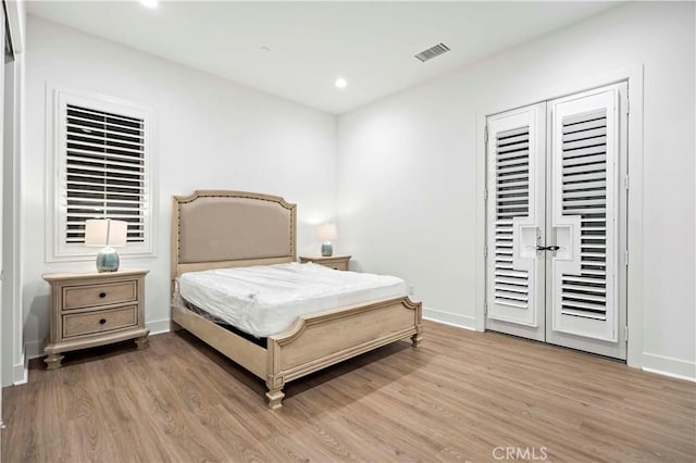 bedroom featuring light hardwood / wood-style flooring