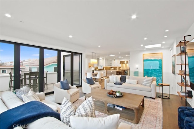 living room with light hardwood / wood-style floors