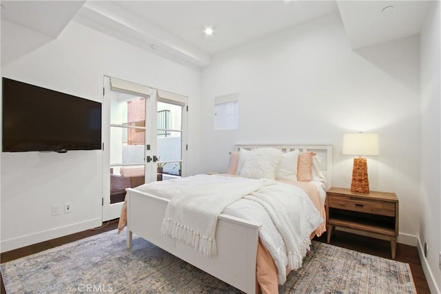 bedroom featuring recessed lighting, wood finished floors, and baseboards