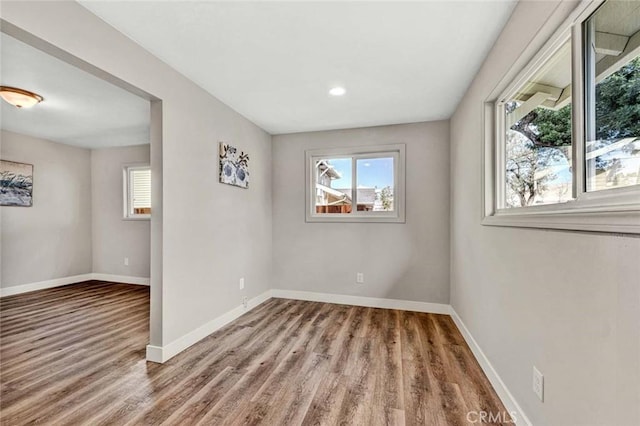 empty room featuring hardwood / wood-style floors