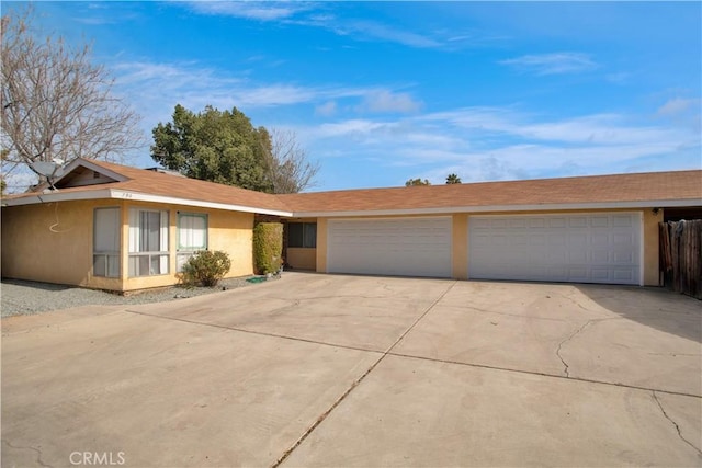 ranch-style home with a garage