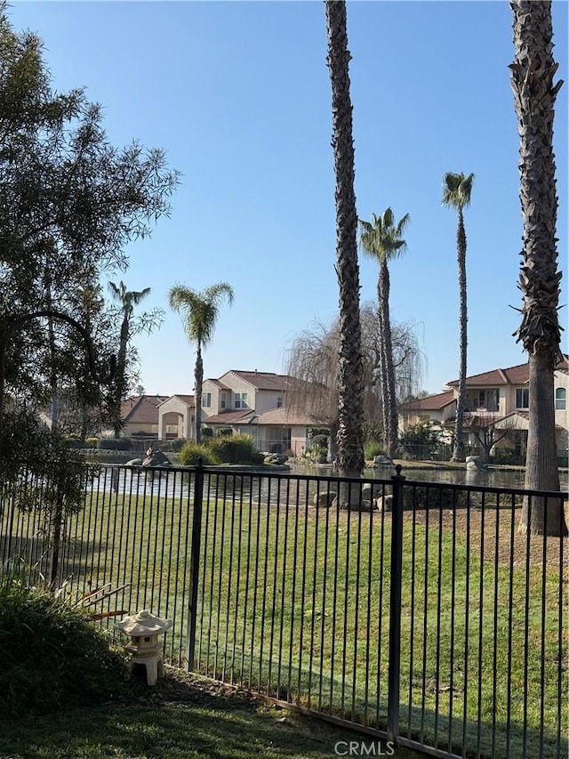 view of yard with a water view