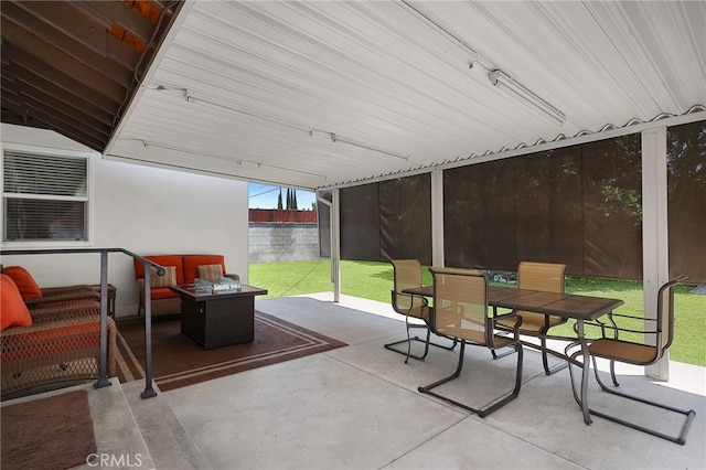 view of patio / terrace with a fire pit