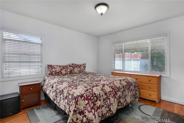 bedroom featuring light hardwood / wood-style floors