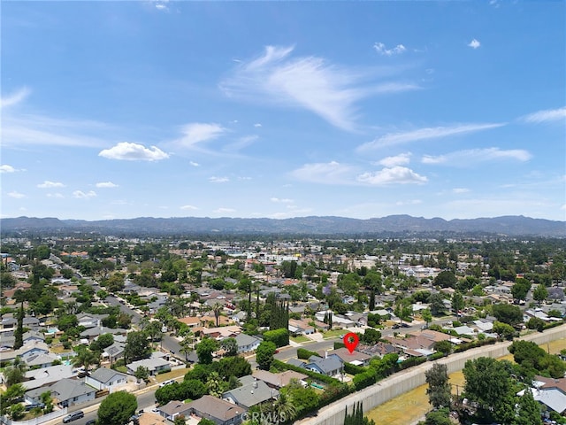 drone / aerial view featuring a mountain view